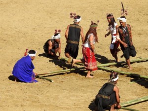 Members of the Kuki tribe perform the Bamboo Dance.